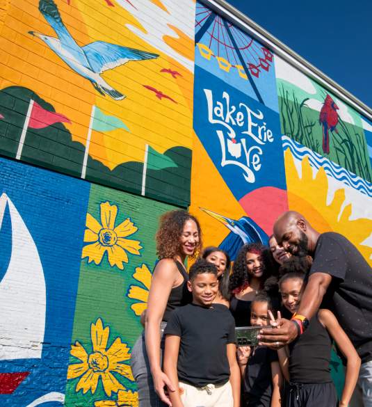 S&IO East Mural family selfie