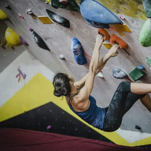 A person rock climbing.
