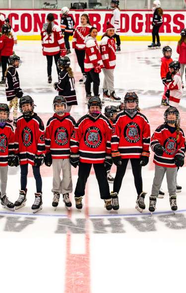 MASC Youth Grant winners Verona Wildcats Hockey Association's girls team players on the ice at La Bahn Arena in Madison, WI