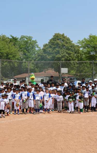 MASC youth grant recipients Black Men Coalition on baseball field