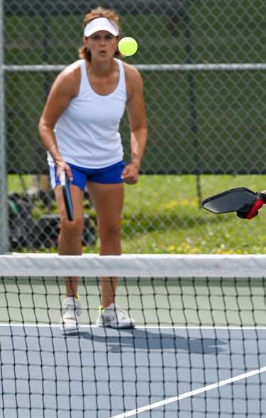 2 pickleball players participate in the Madtown Pickleball Open