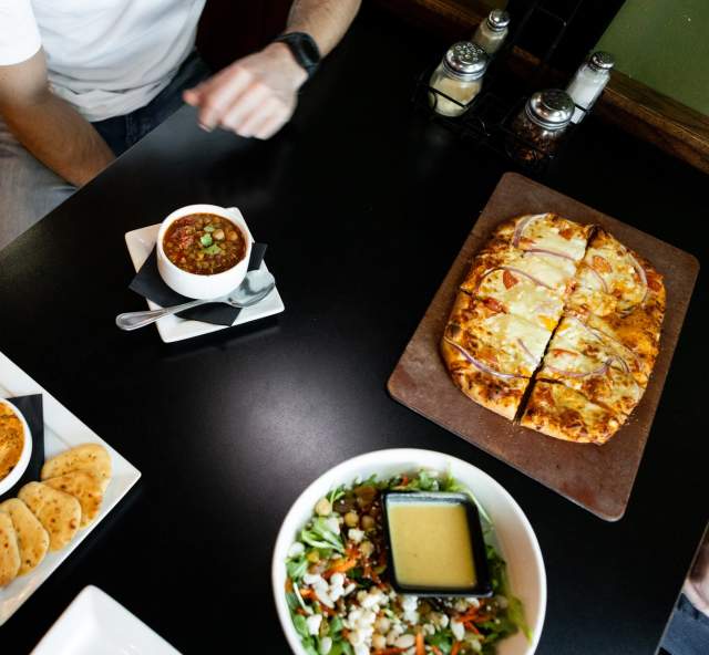 food spread from downtown rapid city, sd restaurant independent ale house  on table