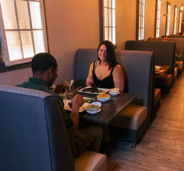 couple dining at downtown rapid city restaurant delmonico grill