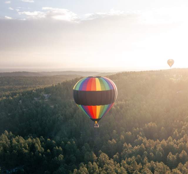 two black hills balloons hot air balloons taking flight from the stratobowl in south dakota