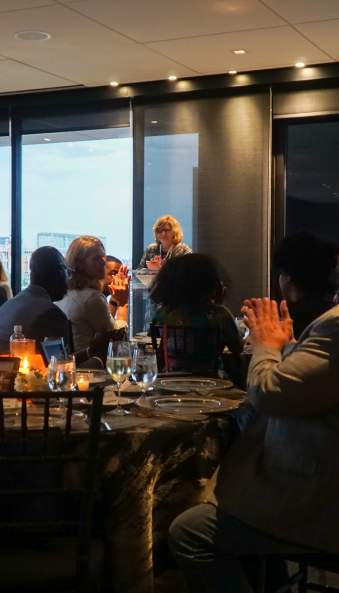 Linda speaking at an event