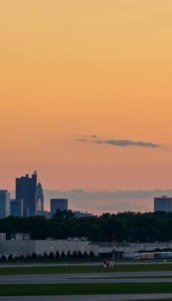 View of Columbus skyline from runway of John Glenn International Airport