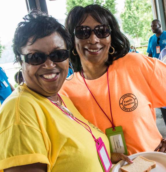 Two women with beautiful smiles enjoying their Family Reunion at Morgan Falls Overlook Pavilion