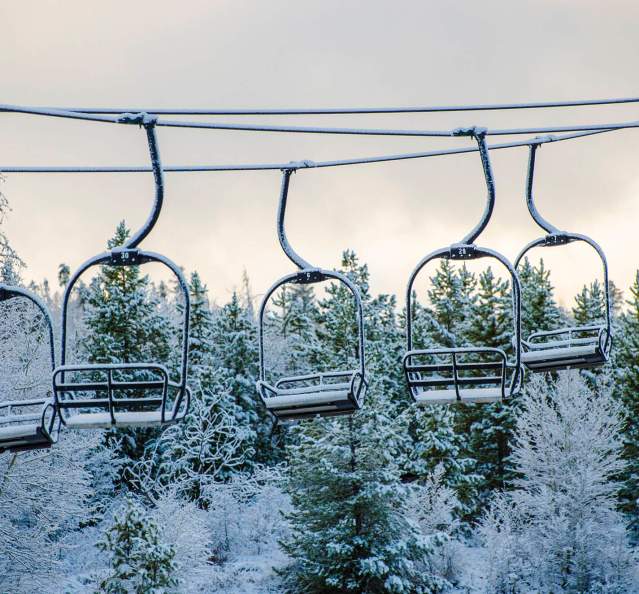 Snowy chairlifts at Granby Ranch