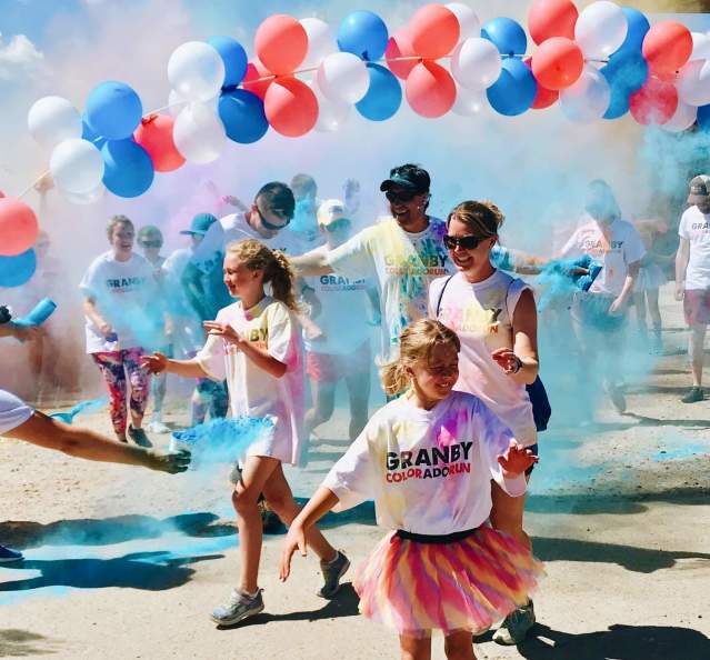 Family at the start line of the Granby 5K Color Run