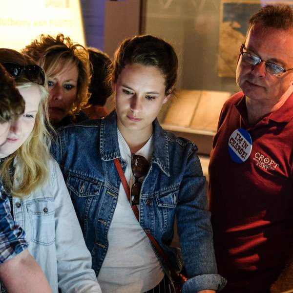 A group of people looks at an exhibit at The D-Day Story in Portsmouth