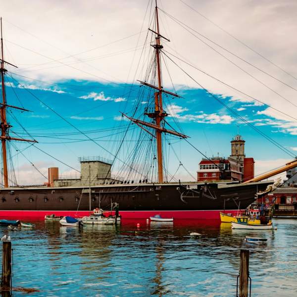 Photograph showing a very vibrant blue sky above HMS Warrior at Portsmouth Historic Dockyard