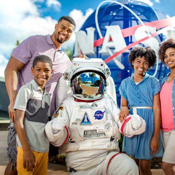 Kennedy Space Center family with astronaut in suit