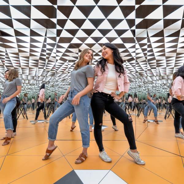 museum of illusions infinity room millenial girls