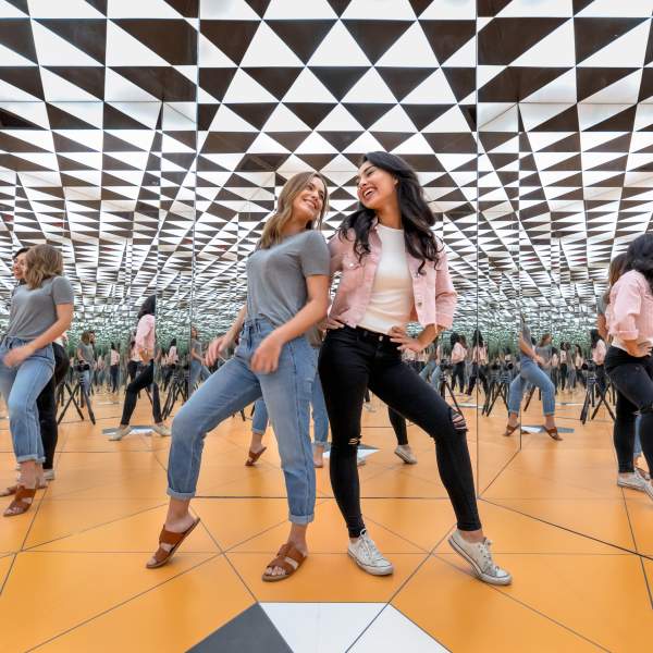 museum of illusions infinity room millenial girls