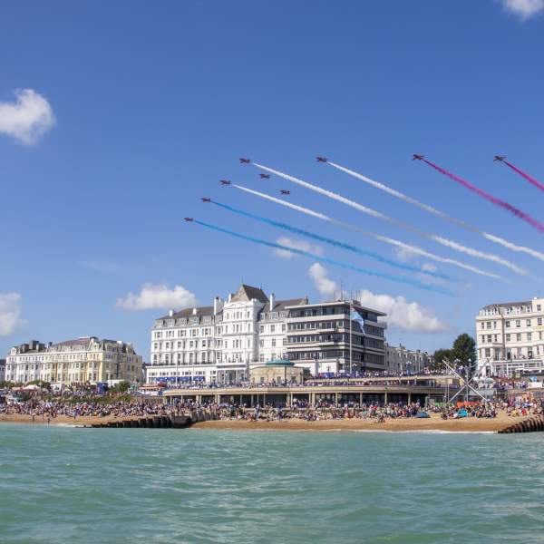 Red arrow display over the seafront at Eastbourne Air Show