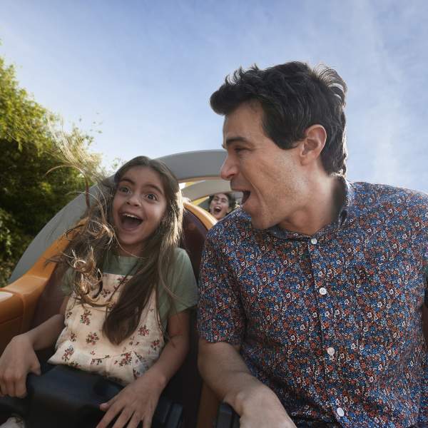 A father and daughter on a Rollercoaster