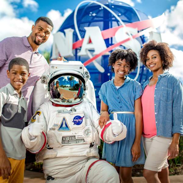 Kennedy Space Center family with astronaut in suit