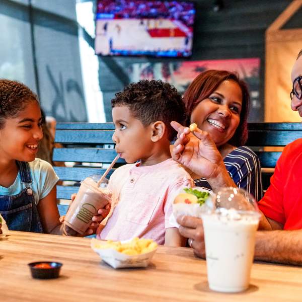 family at Shake Shack at ICON Park