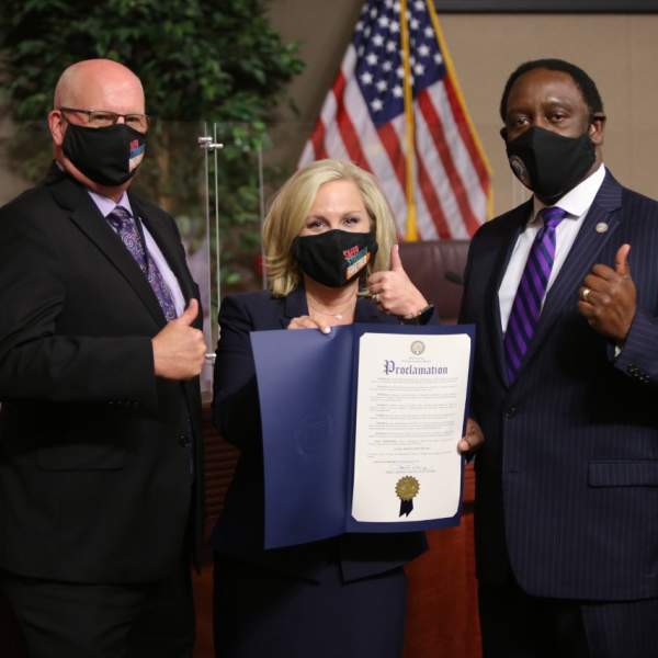 Global Meetings Industry Day (GMID) proclamation pictured with (left to right) Mark Tester, Executive Director, Orange County Convention Center, Casandra Matej, President & CEO, Visit Orlando and Mayor Demings