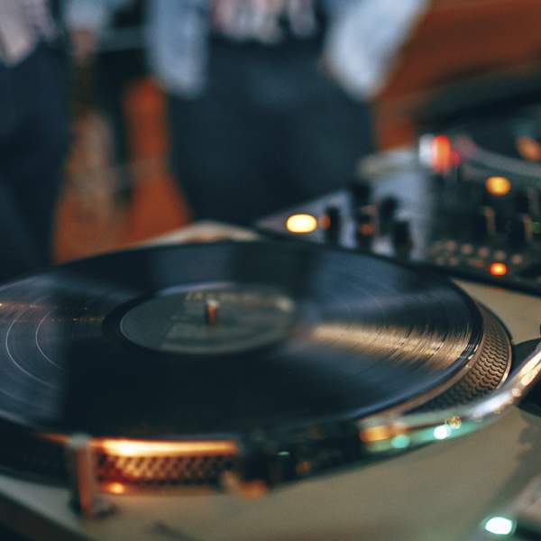 Vinyl decks playing music at a nightclub