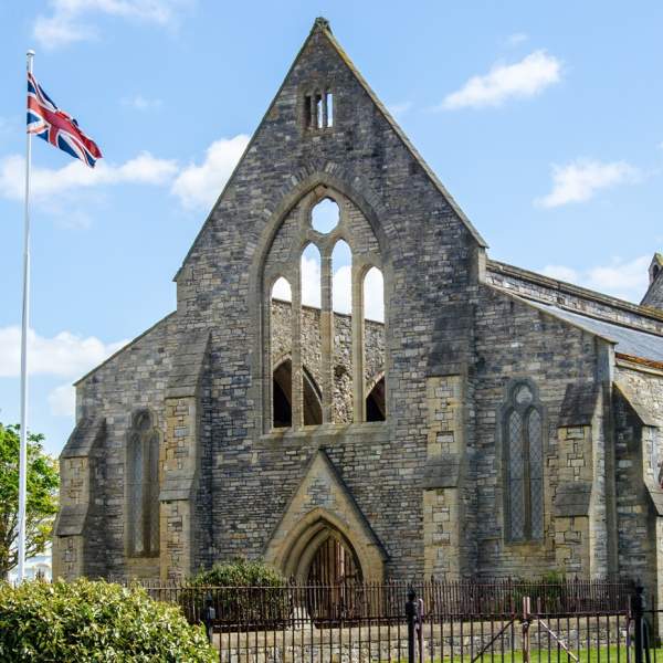 Photograph showing the Royal Garrison Church in Old Portsmouth, a church with part of the roof missing following bomb damage in The Blitz.