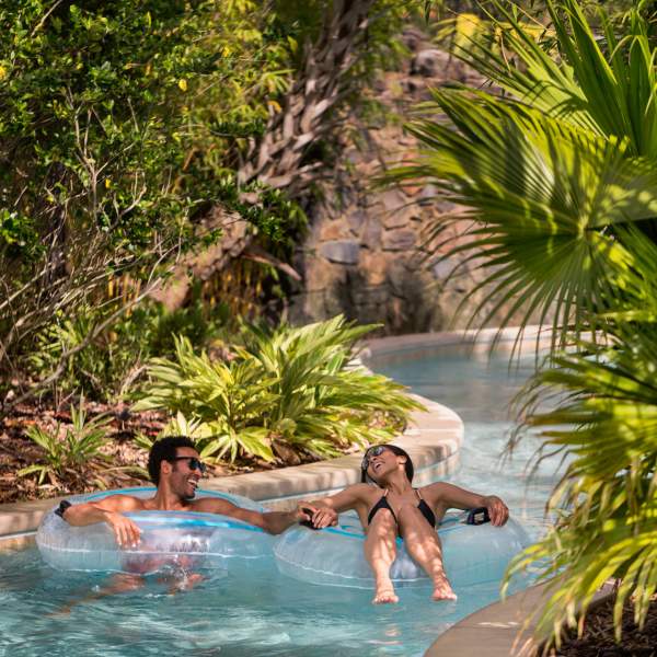 Four Seasons Resort Orlando at Walt Disney World® Resort lazy river couple