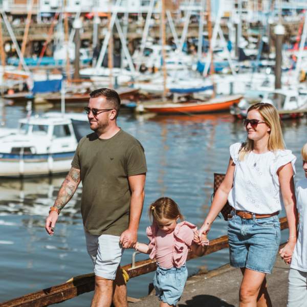 A family exploring Bridlington Harbour