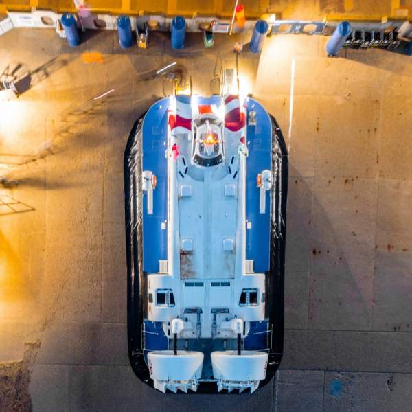 An aerial photograph showing a hovercraft at the Hovertravel terminal at night