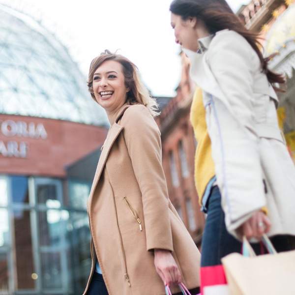 ladies shopping in Belfast, outside Victoria Square Shopping Centre.