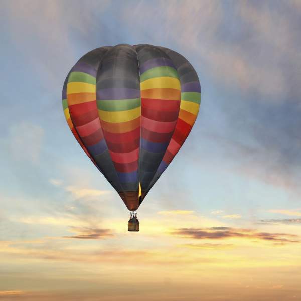 colorful hot air balloon in a sunrise sky