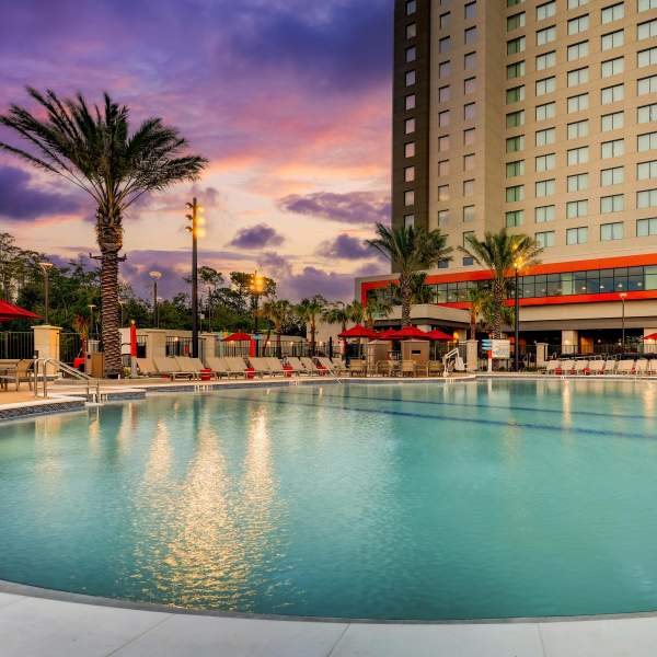 Pool at Drury Plaza Hotel Orlando at dusk