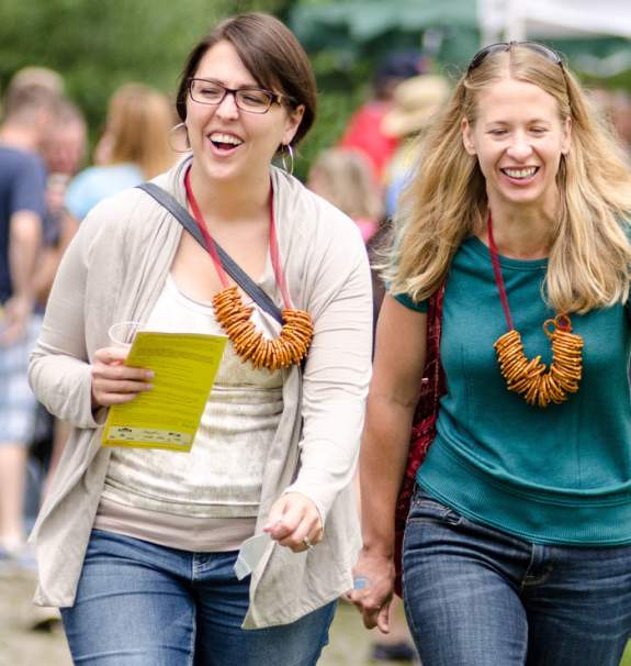 Two smiling women at Beer Festival