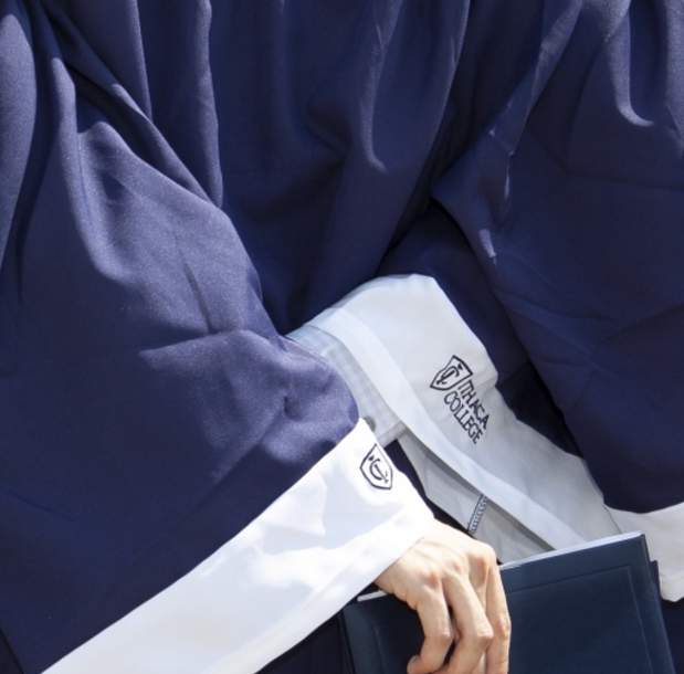 Ithaca College graduates hugging