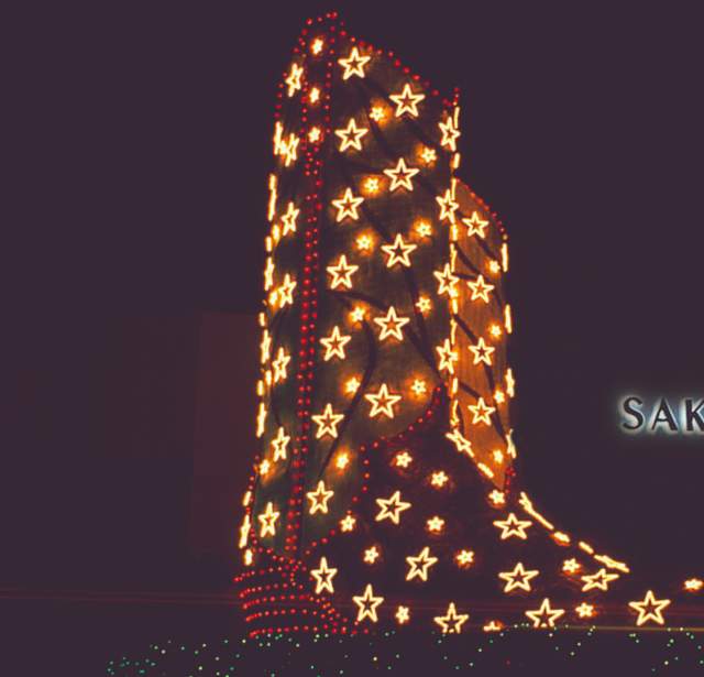 Giant boots sculpture lit with star lights