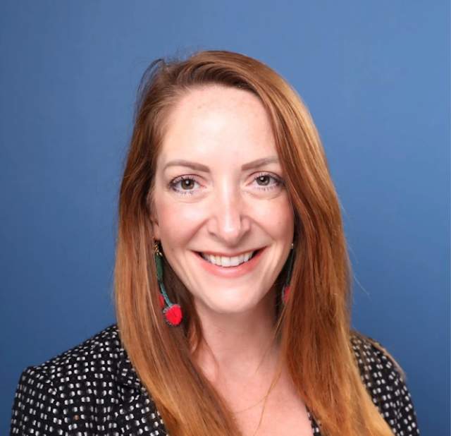 Michelle Costanzo posing for a headshot