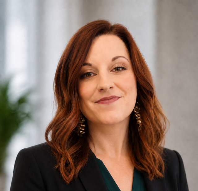 Corynn Hansen posing for a headshot.