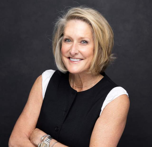 Lisa Nuccio posing for a headshot.