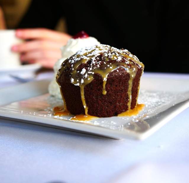 A chocolate cake drizzled in caramel.