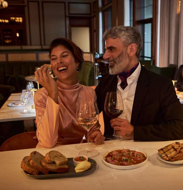 Couple sharing a meal in fine dining restaurant