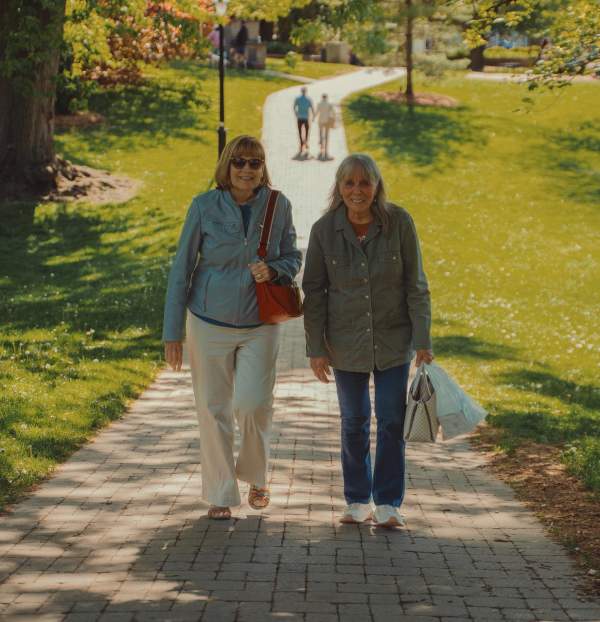 Old women walking on a park