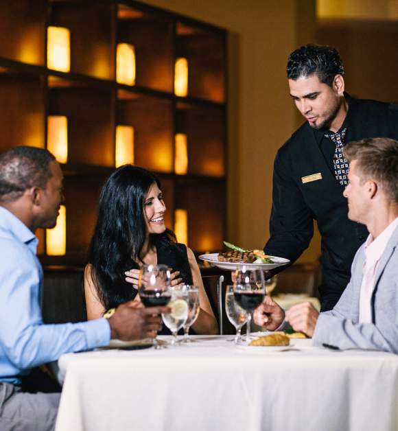 Jack's Place waiter serving table