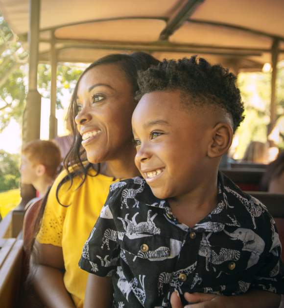 A mother and son on a Kilimanjaro Safari at Disney's Animal Kingdom® Theme Park
