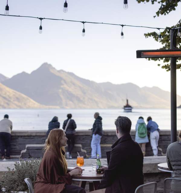 Dining al fresco at Soda Bar overlooking lake and mountains