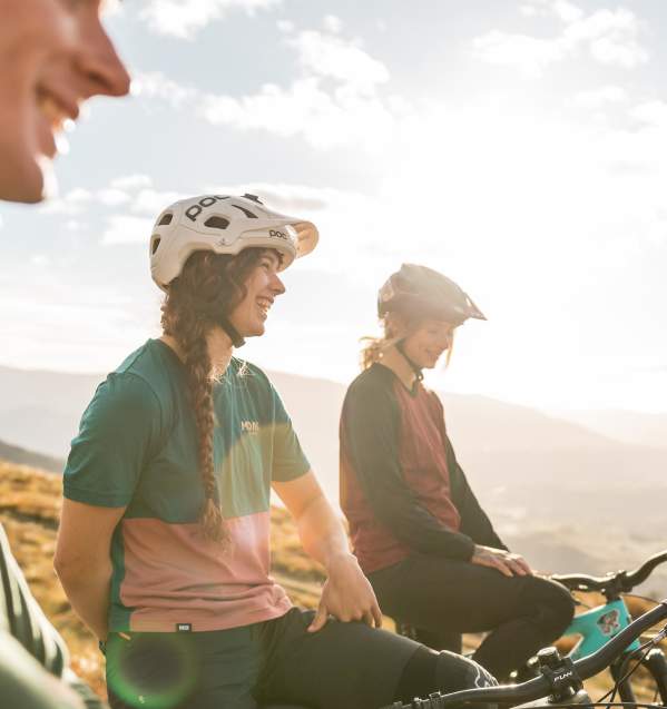 Close up of three mountain bikers