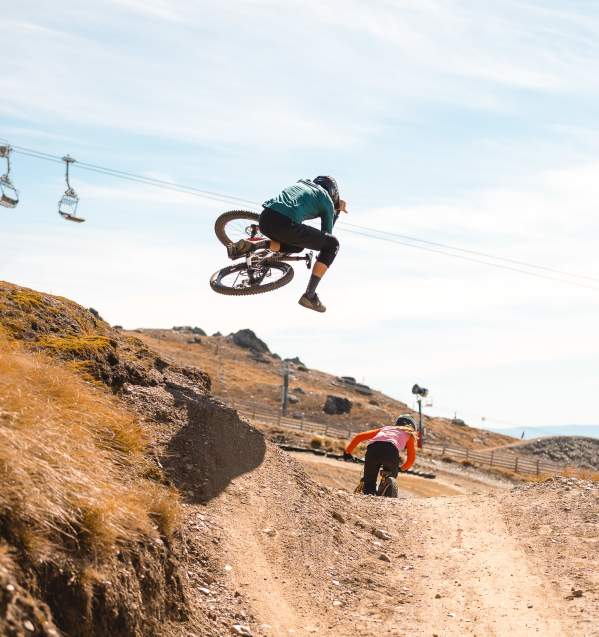 Mountain Biking does a jump at Cardrona Bike Park