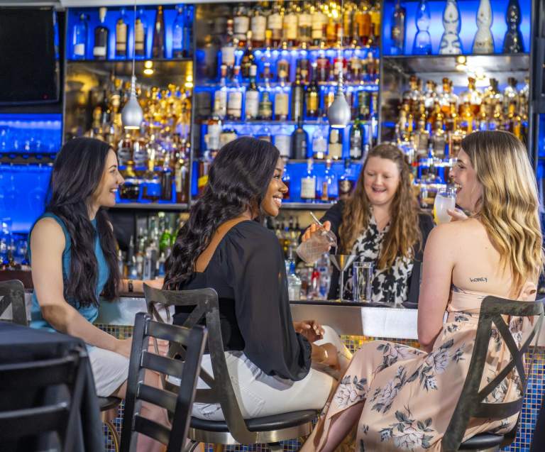 ladies having a drink at Sea Blue Bar