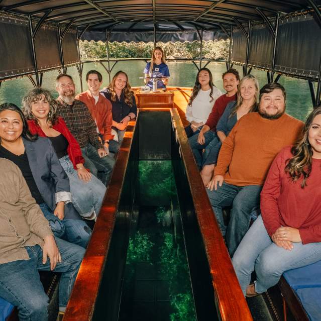 The Visit San Marcos and Downtown San Marcos team take in a Glass-Bottom Boat Tour at The Meadows Center