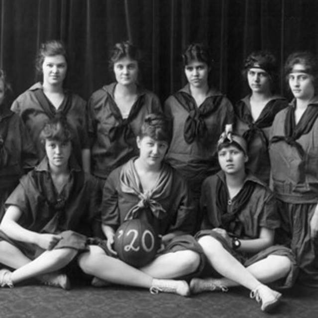 This black and white photograph shows a 1920s Women's Basketball team.