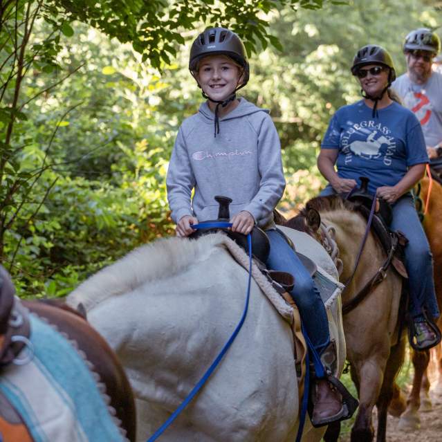 Child horseback riding at Shelby Trails