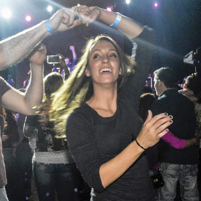 Couple dancing with woman spinning